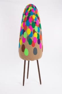 Masako Miki, Karakasa Obake (straw umbrella shapeshifter), 2022. Wool on EPS foam, walnut wood. 78 x 24 inches (198.1 x 61 cm).