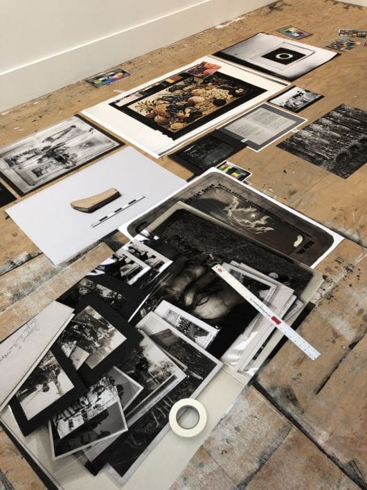 Reference images and prints in Syjuco's studio at Joan Mitchell Center, New Orleans, March 2021 artist residency