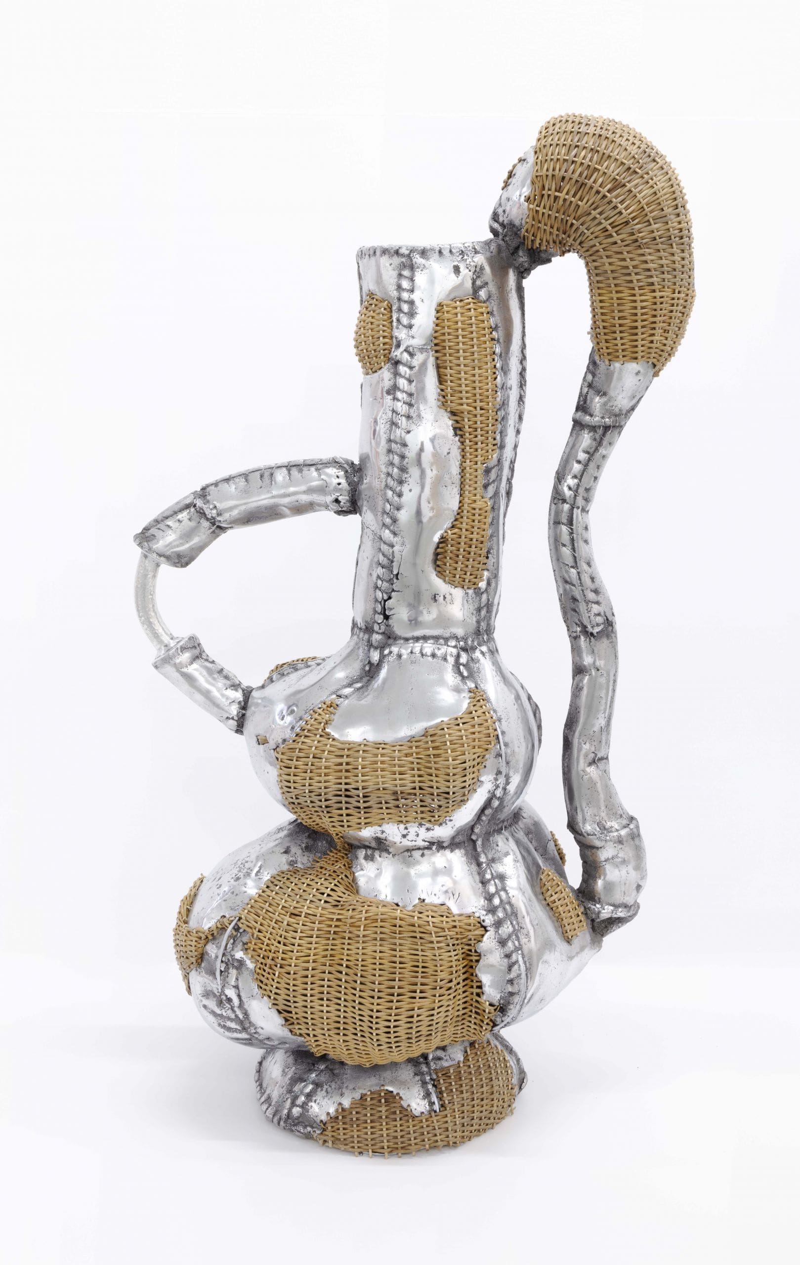 Chris Wolston, Betty Vessel, 2022, Sand-casted aluminum and 100% Colombian Mimbre, 44 x 23 x 15 inches (111.8 x 58.4 x 38.1 cm)